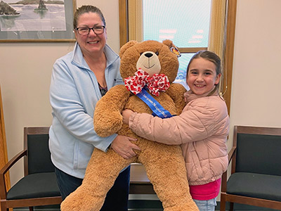 Kelly and Kaelyn with Large Stuffed Teddy Bear