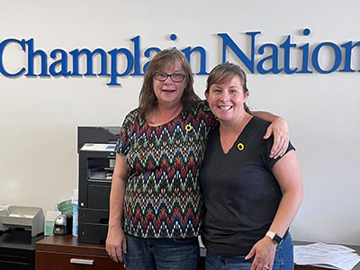 Heather and Renee wearing Sunflower Pins