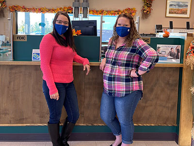 Champlain Employees Wearing Tops and Jeans