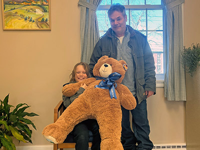 Lexington and Tukk with Large Stuffed Teddy Bear