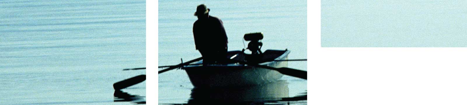 Man Rowing a Boat