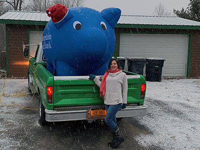 Kurri Westover with Piggy Bank Balloon in Truck Cab