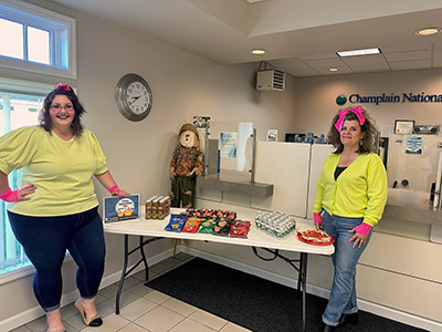 Erin and Kathrine Standing Next to Treats Table