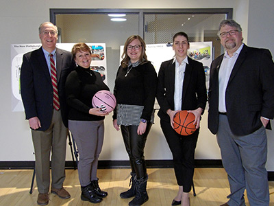 Five People Holding Basketballs