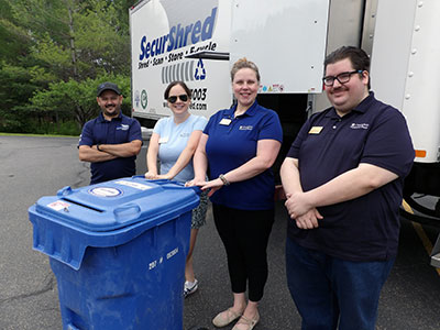 Keene employees in front of truck