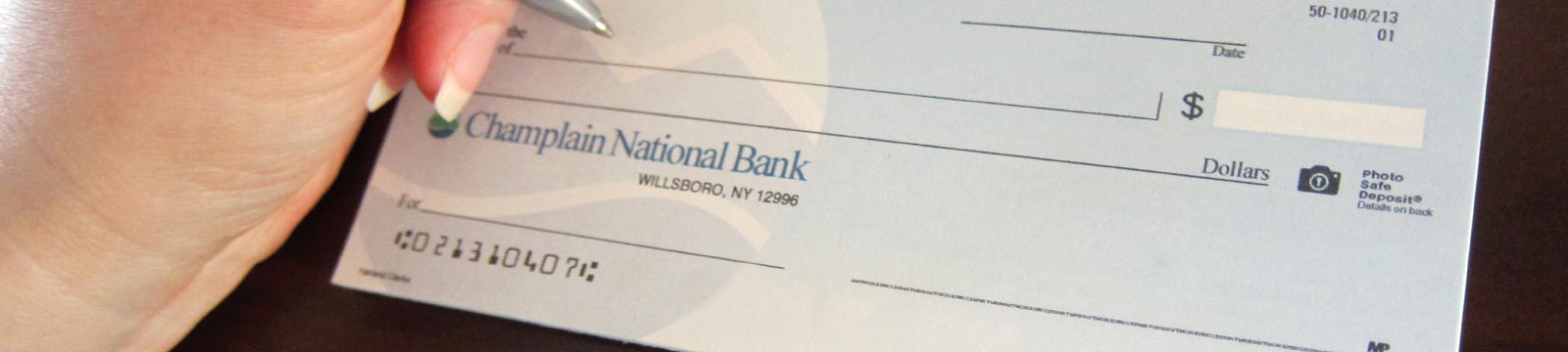 Bank Check with Hand and Pen
