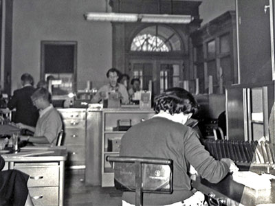 Interior of Old Bank with Employees Working