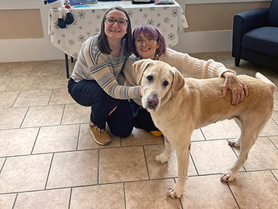 Emily and Alex with a Dog